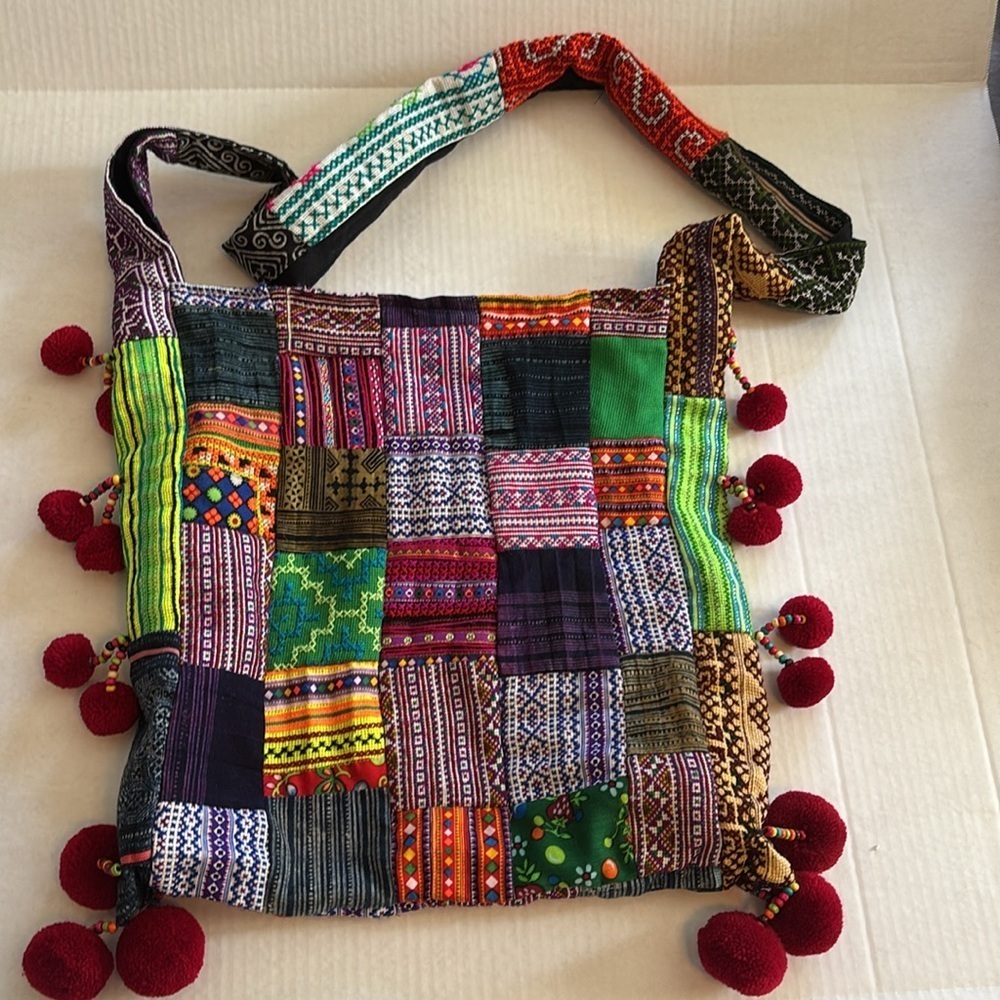 PATCHWORK BOHO SLING STYLE CROSSBODY COLORED PATCHES WITH RED BALL TASSELS